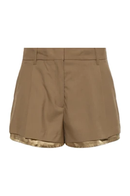 Ullshorts med exponerad foder