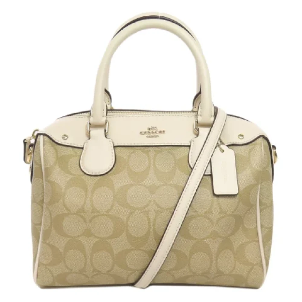 Coach Pre-owned Plastic handbags Beige Dames