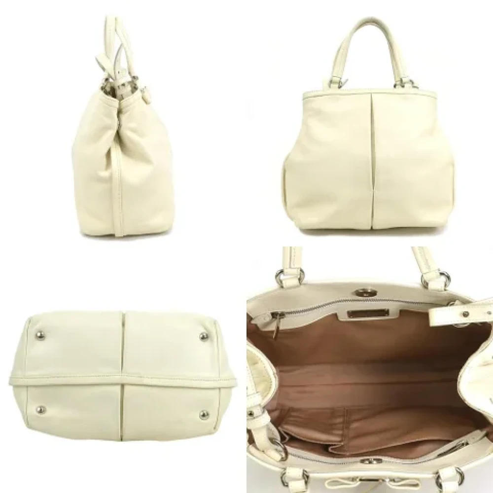 Salvatore Ferragamo Pre-owned Leather handbags Beige Dames