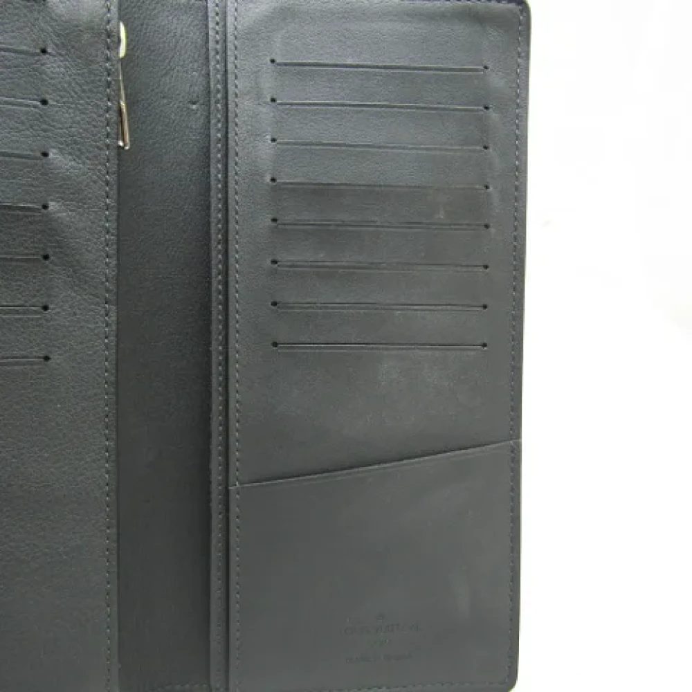 Louis Vuitton Vintage Pre-owned Leather wallets Black Heren