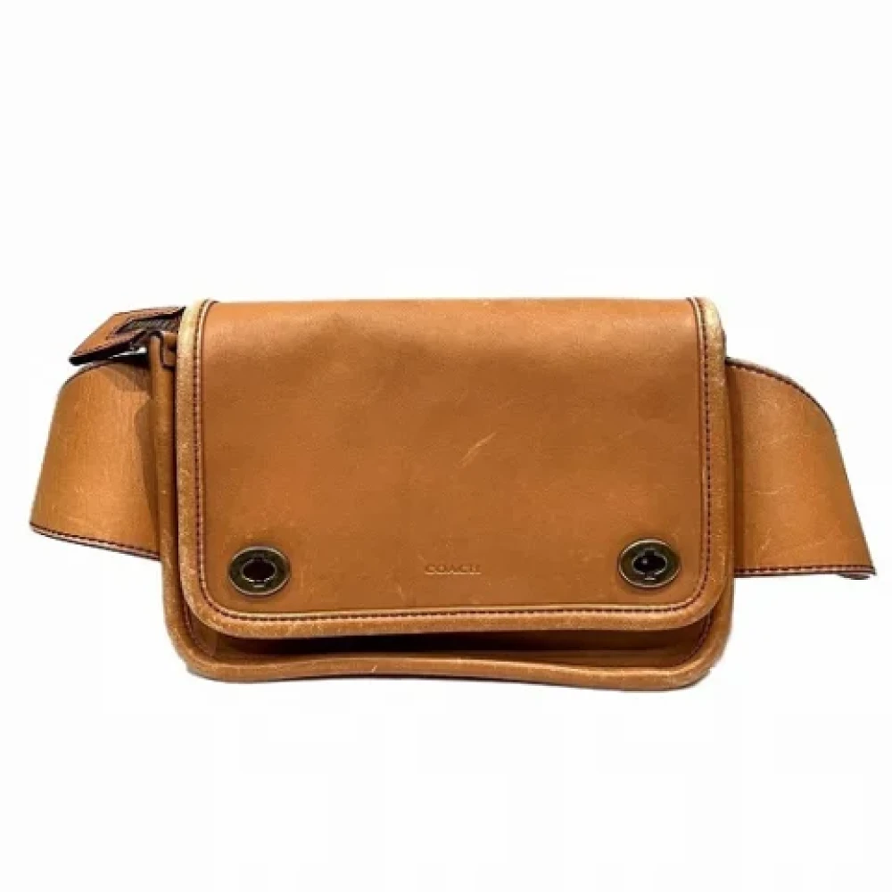 Coach Pre-owned Leather clutches Brown Dames