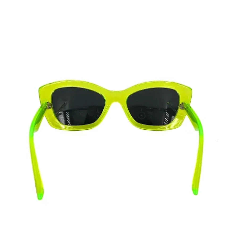 Prada Vintage Pre-owned Plastic sunglasses Green Dames