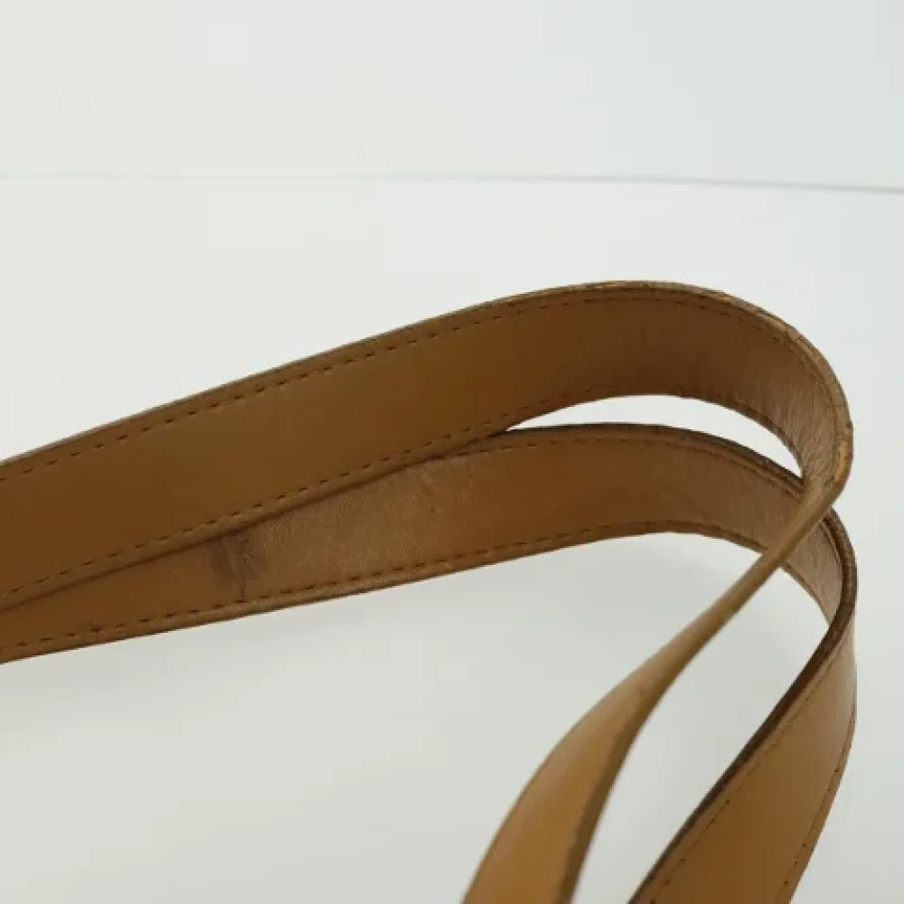 Saint Laurent Vintage Pre-owned Canvas handbags Brown Dames