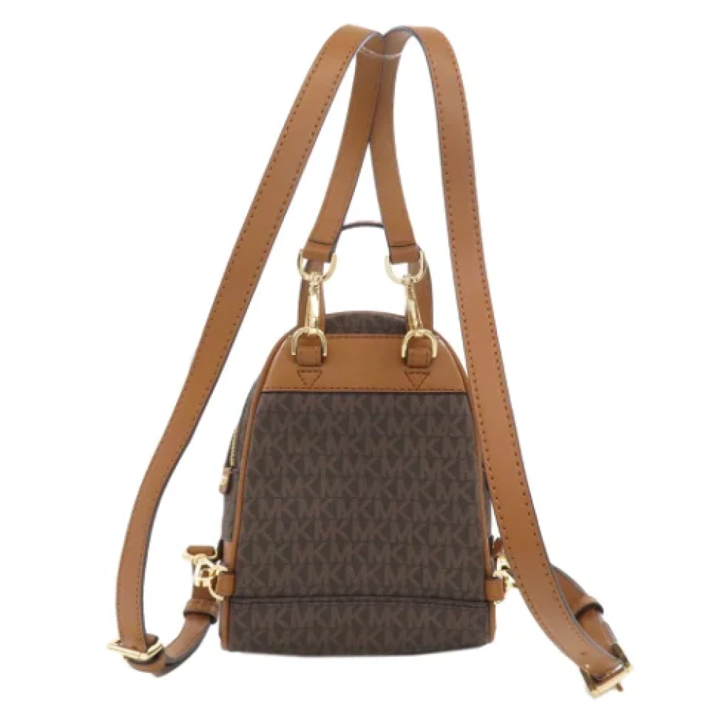 Michael Kors Pre-owned Plastic backpacks Brown Dames