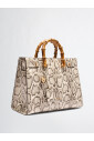 sac-a-main-python-tachete