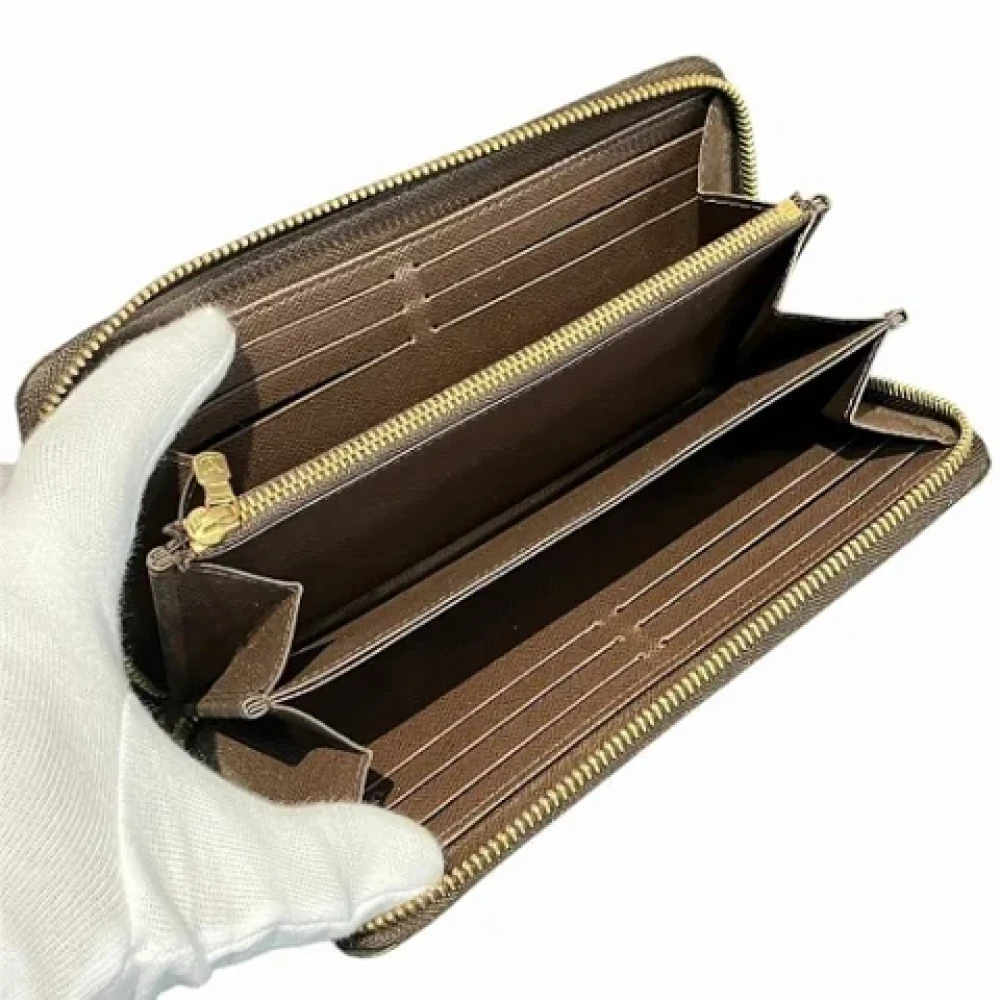Louis Vuitton Vintage Pre-owned Fabric wallets Brown Dames