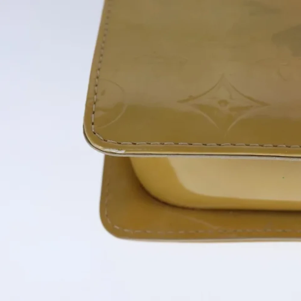 Louis Vuitton Vintage Pre-owned Leather clutches Beige Dames