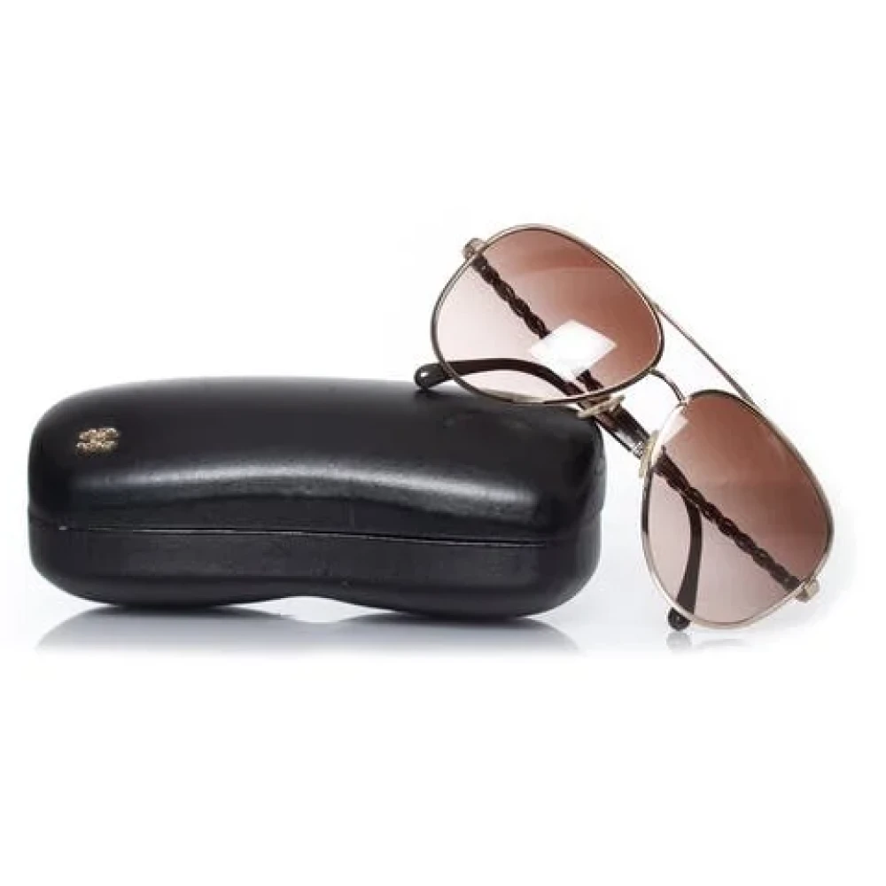 Chanel Vintage Pre-owned Metal sunglasses Brown Heren