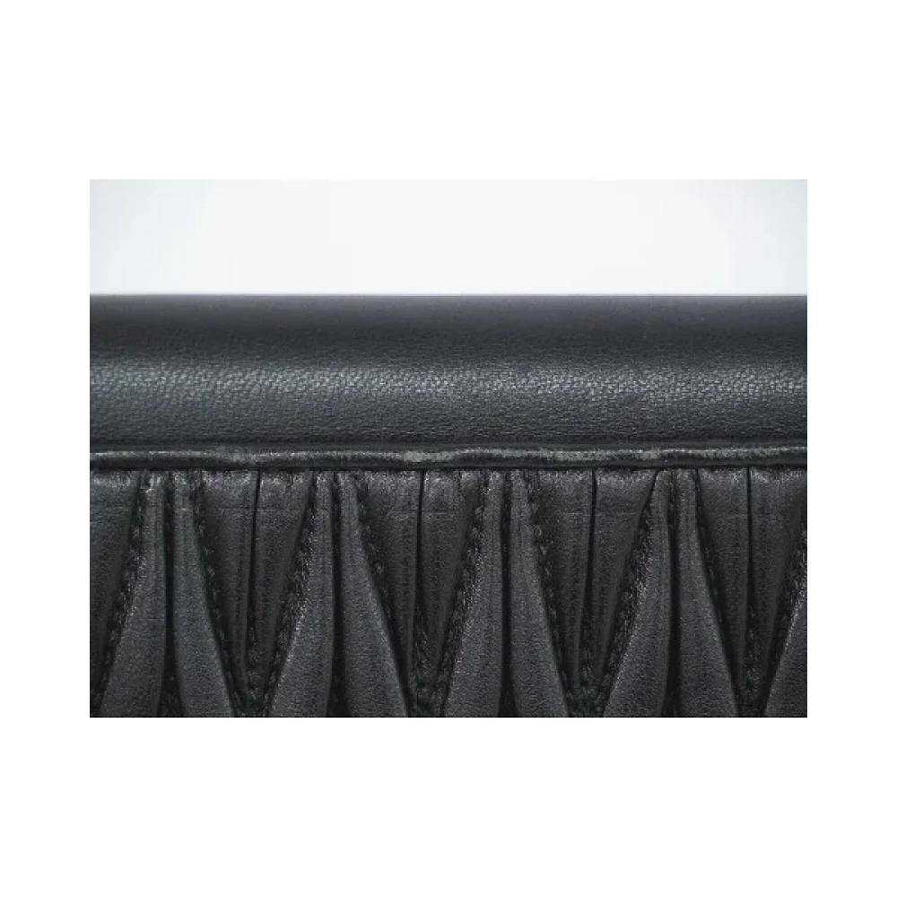 Miu Pre-owned Leather wallets Black Dames
