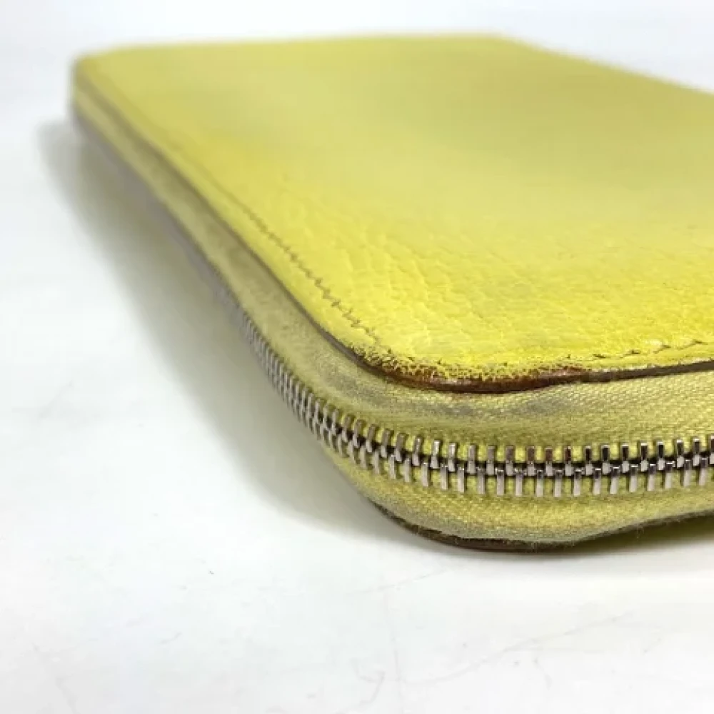 Hermès Vintage Pre-owned Leather wallets Yellow Dames