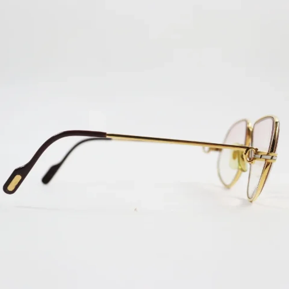 Cartier Vintage Pre-owned Metal sunglasses Yellow Heren