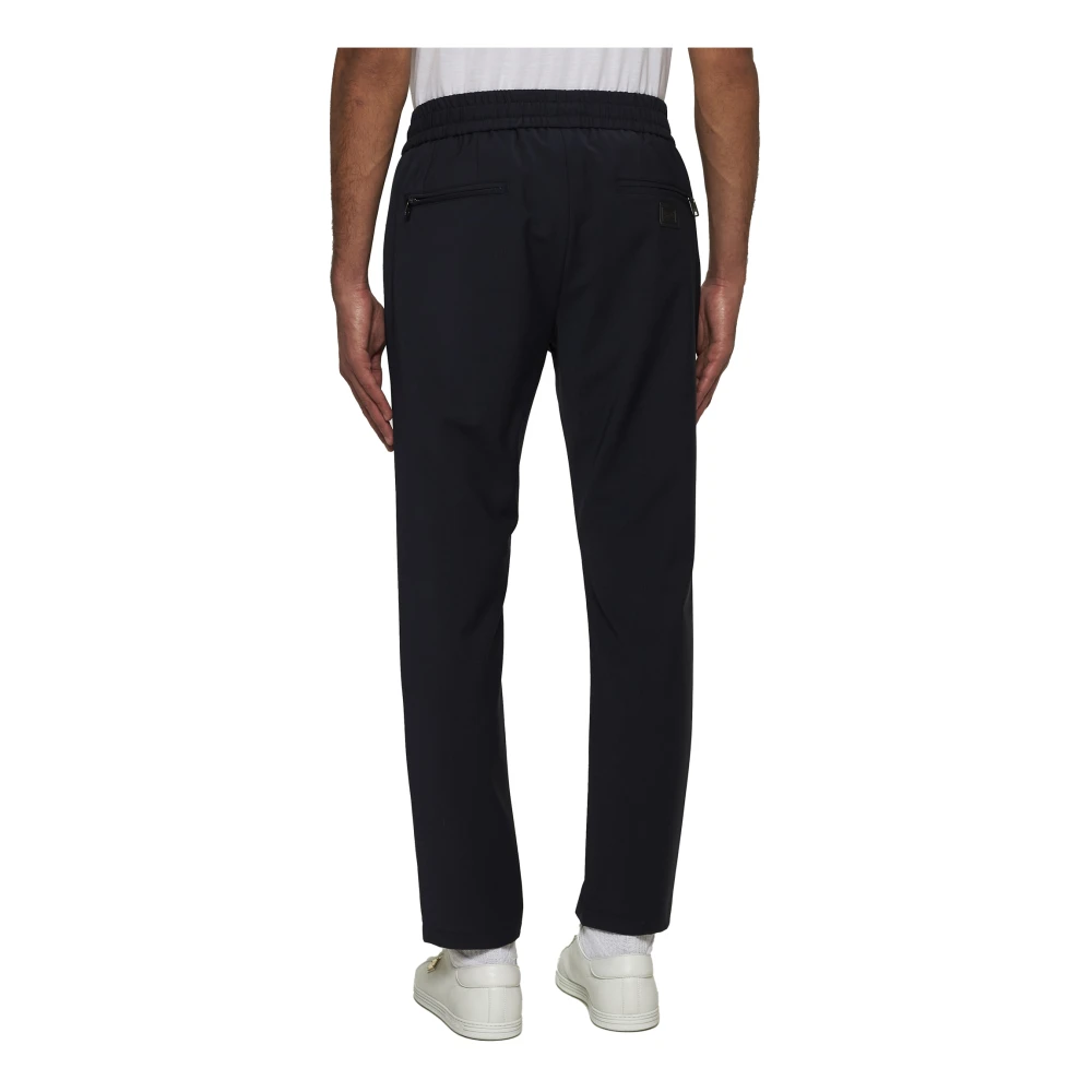 Dolce & Gabbana Blauwe elastische broek met ritssluiting zakken Blue Heren