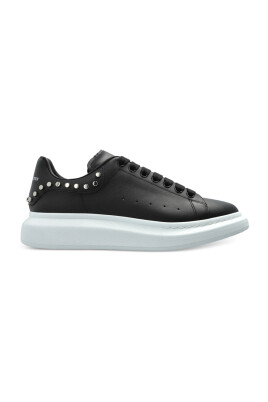 black-slip-on-sneaker-with-perforated-detailing