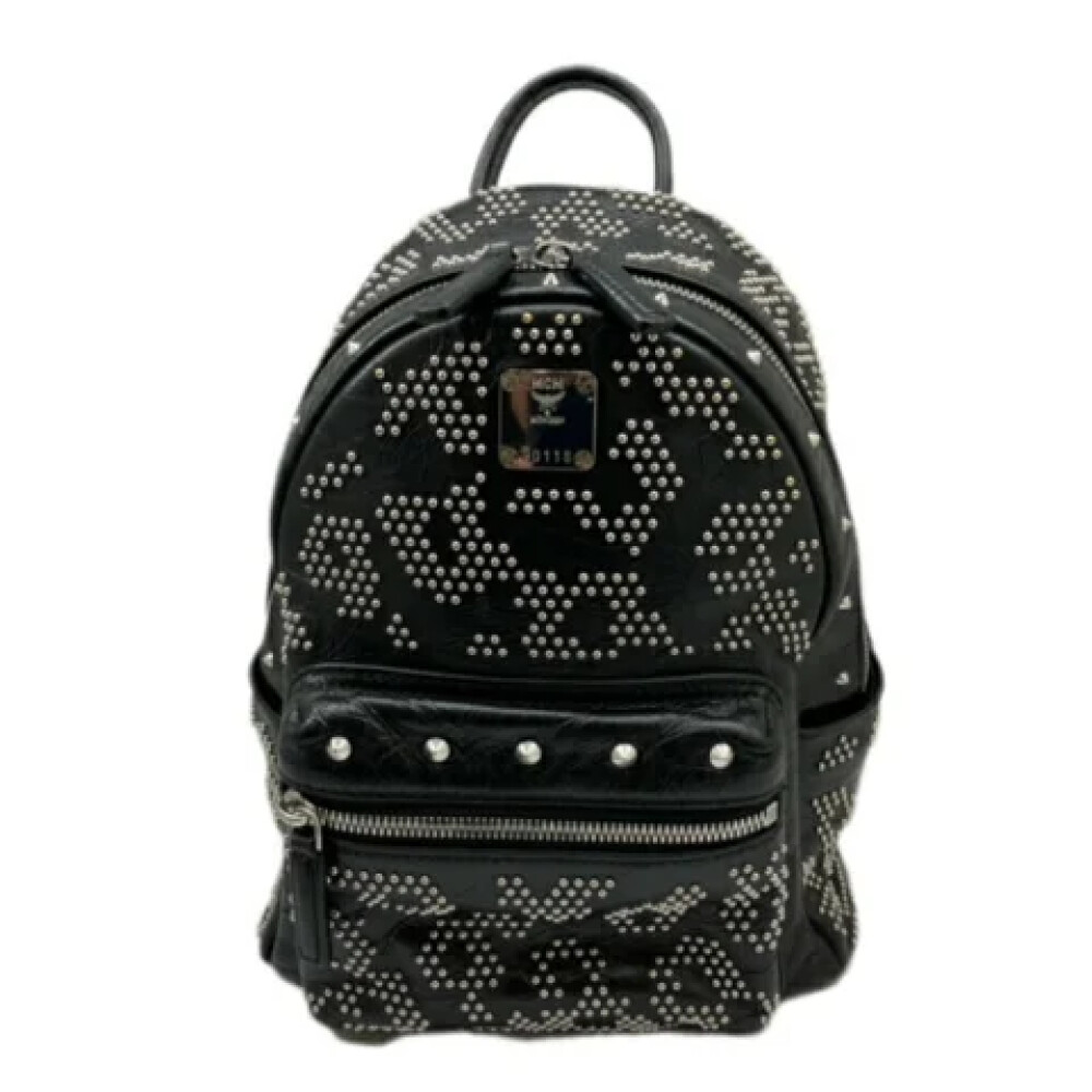 Black mcm backpack with studs best sale