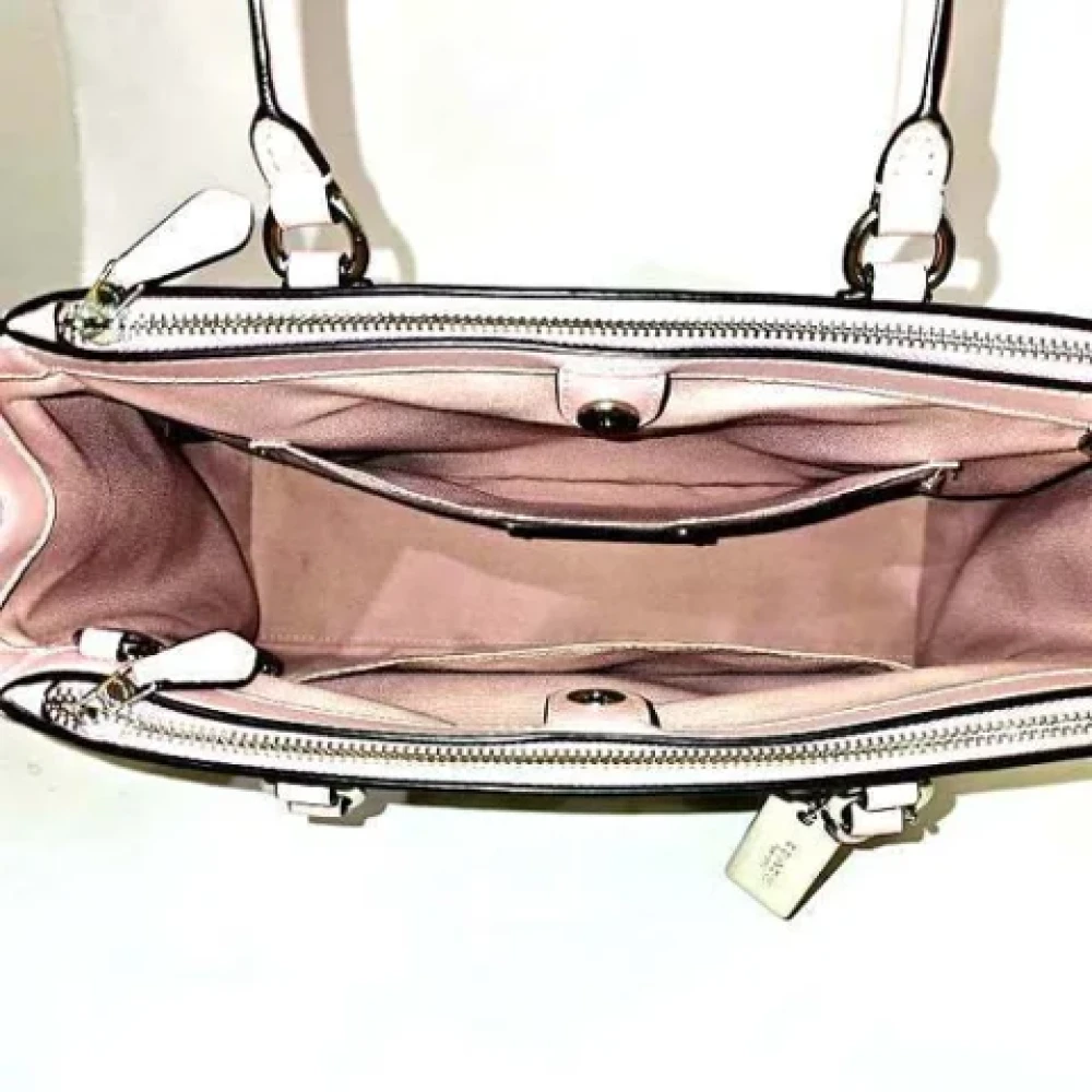 Coach Pre-owned Plastic handbags Beige Dames