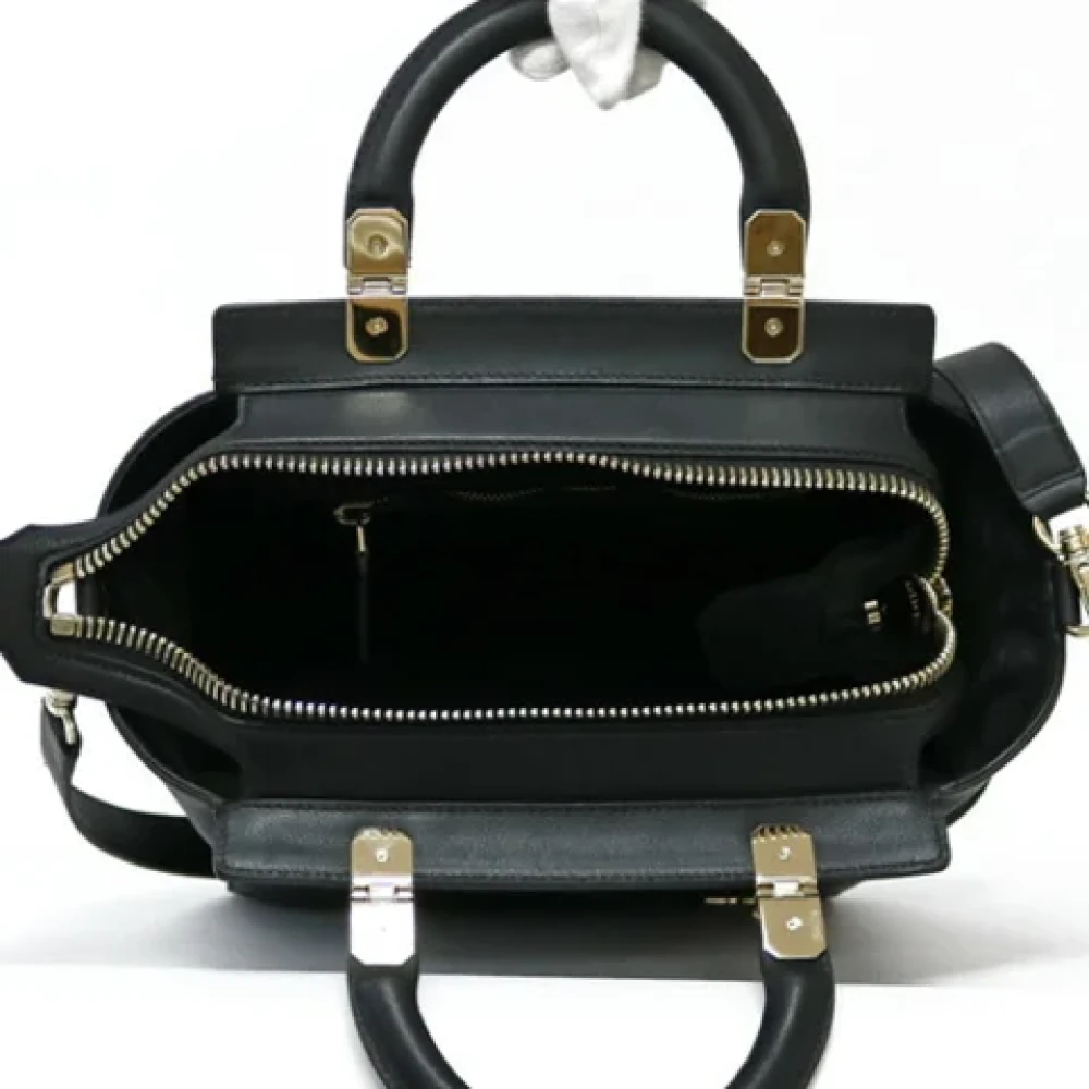 Givenchy Pre-owned Fabric handbags Black Dames