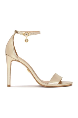 Guld sandaler med inbyggd klack