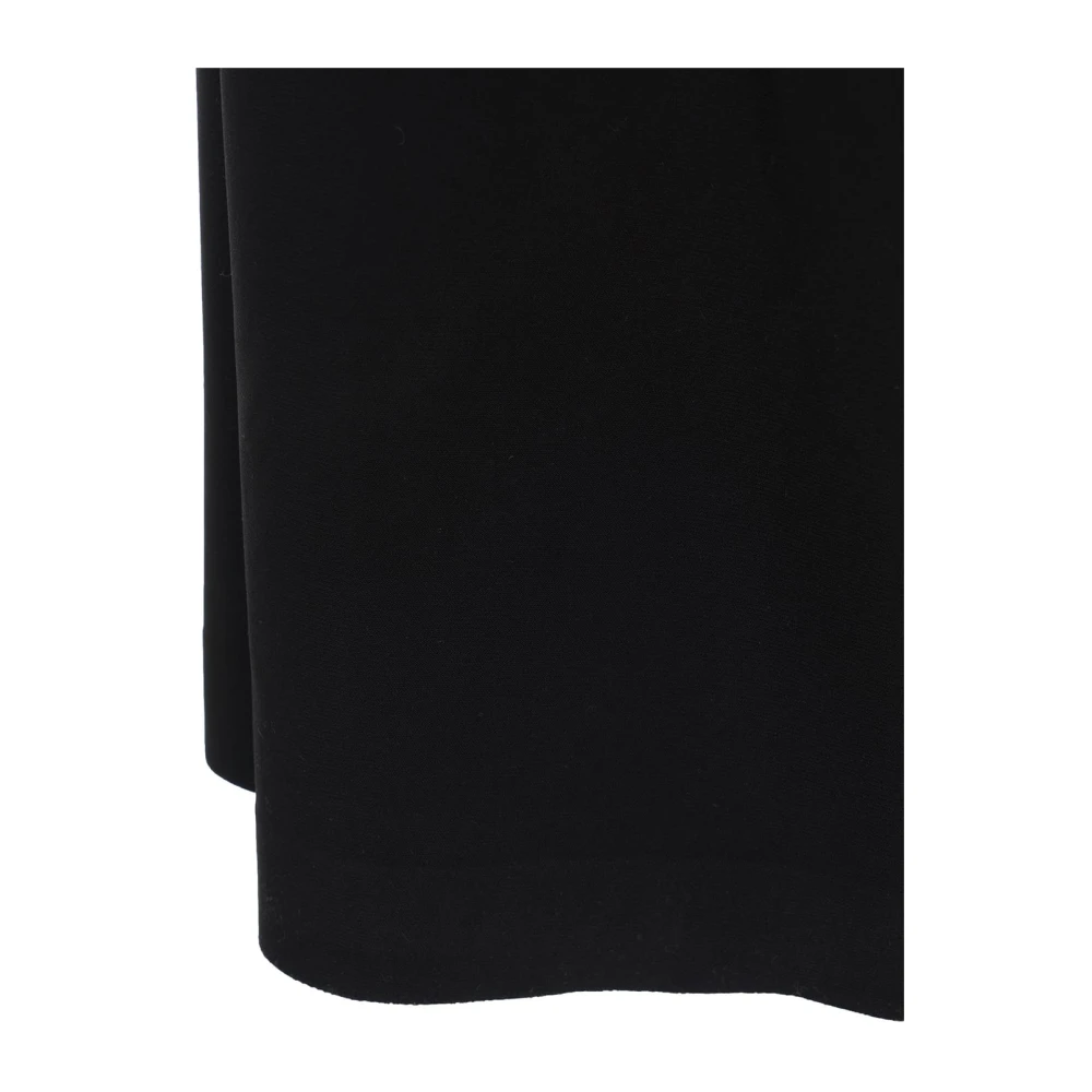 Norma Kamali Zwarte Jumpsuit met Wijde Pijpen V-Hals Black Dames