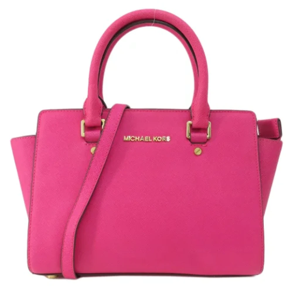 Michael Kors Pre-owned Fabric handbags Pink Dames