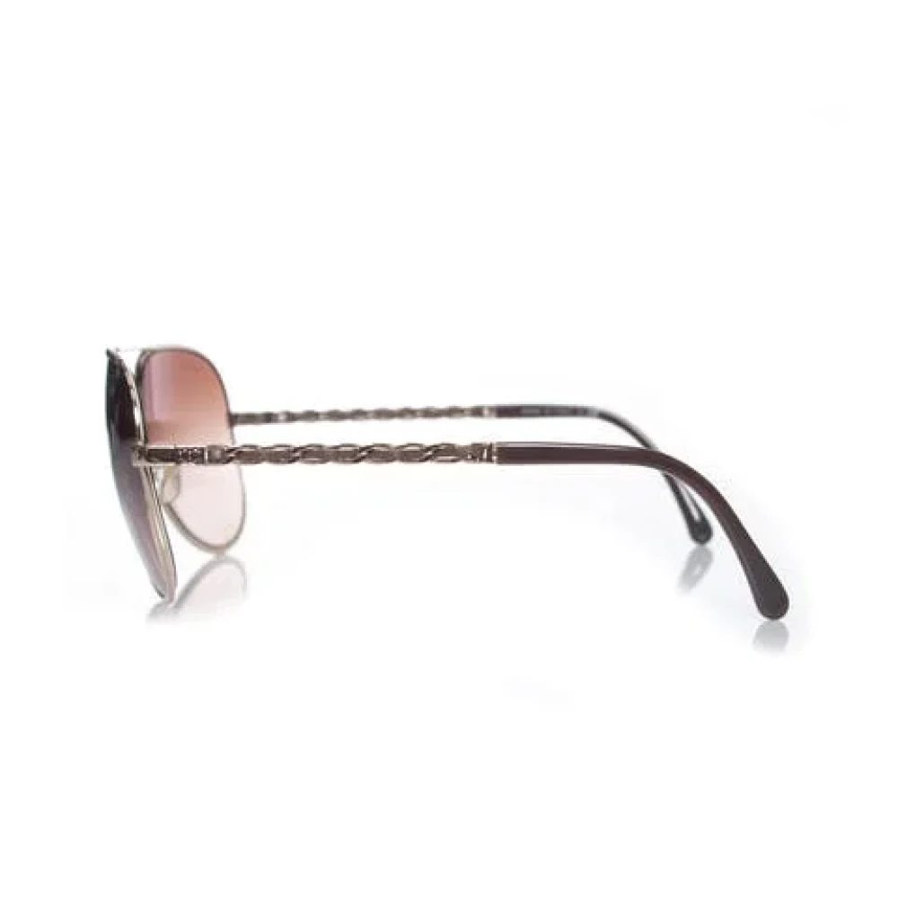 Chanel Vintage Pre-owned Metal sunglasses Brown Heren
