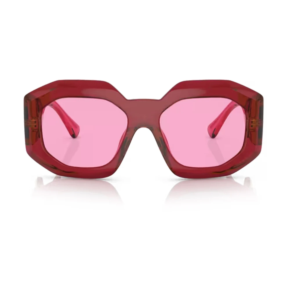 Solbriller med uregelmessig form, fuchsia linse og gjennomsiktig rød ramme