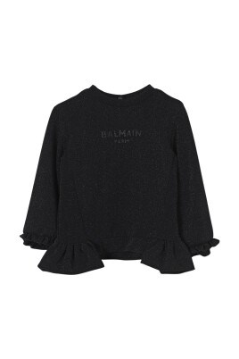 haut-en-tricot-brillant-avec-manches-a-volants