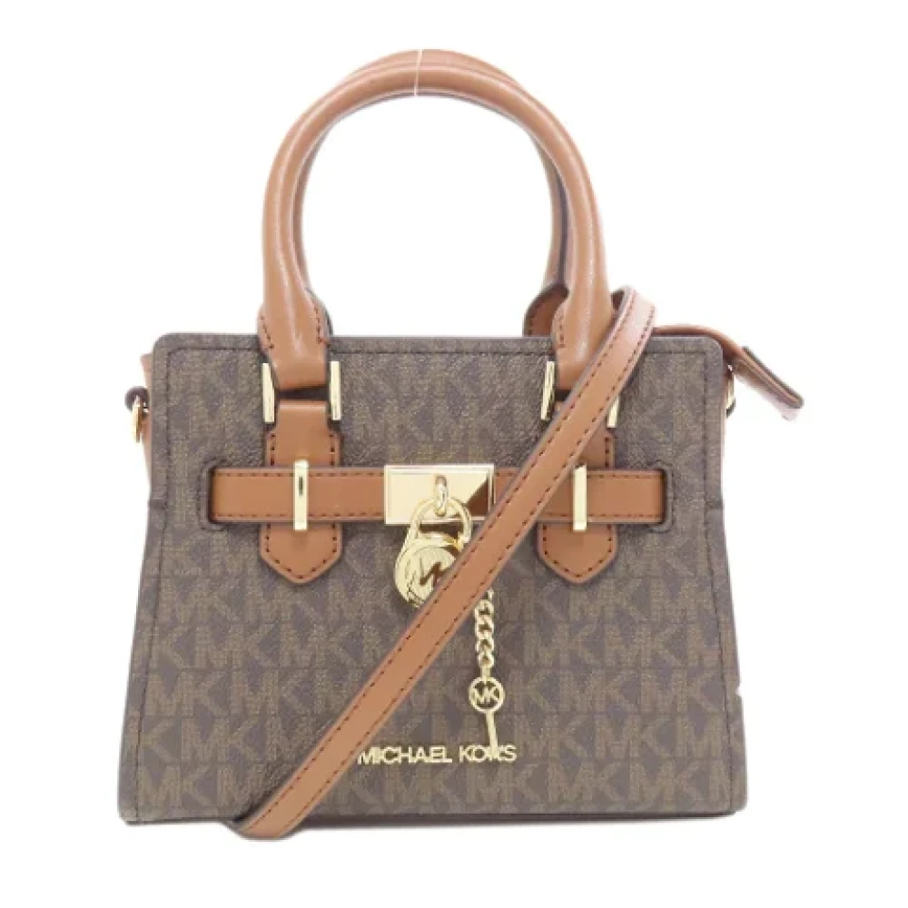 Michael Kors Pre-owned Plastic handbags Brown Dames