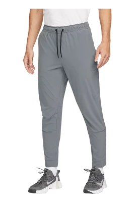 Unlimited Dri-FIT byxor med dragkedja vid manschetten, mångsidiga