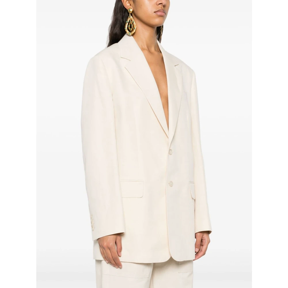 Filippa K Roomkleurige jas met knoopsluiting Zakken Beige Dames