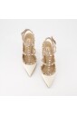 rockstud-pointed-toe-caged-pumps