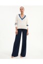 white-cable-knit-v-neck-sweater