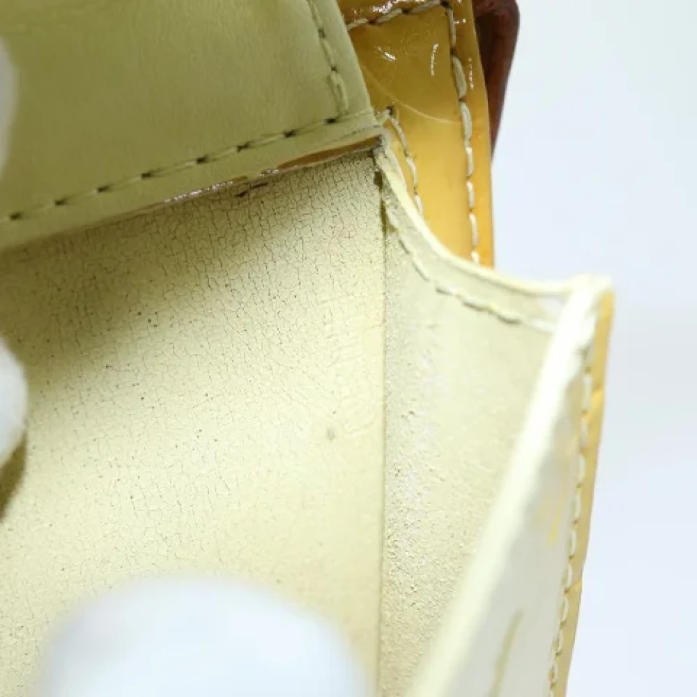 Louis Vuitton Vintage Pre-owned Leather clutches Yellow Dames