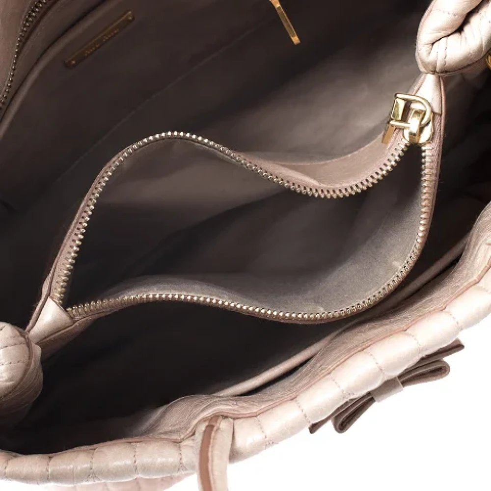 Miu Pre-owned Leather totes Beige Dames