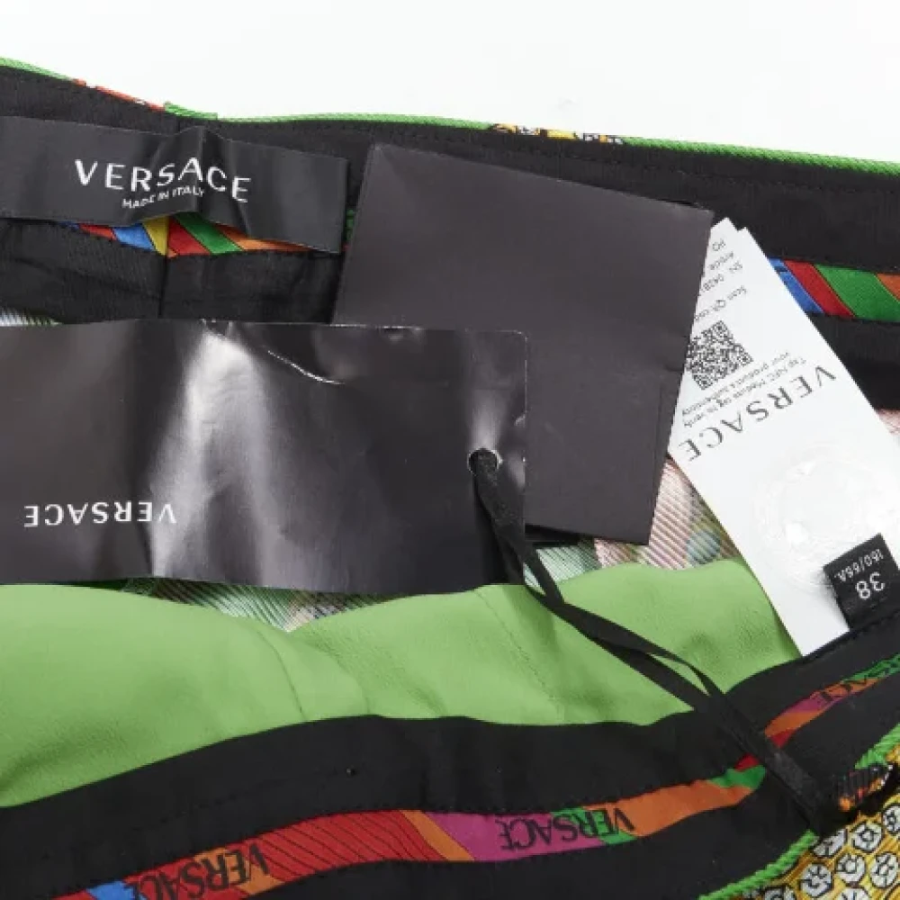 Versace Pre-owned Fabric bottoms Green Dames