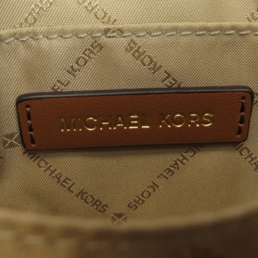 Michael Kors Pre-owned Plastic backpacks Brown Dames