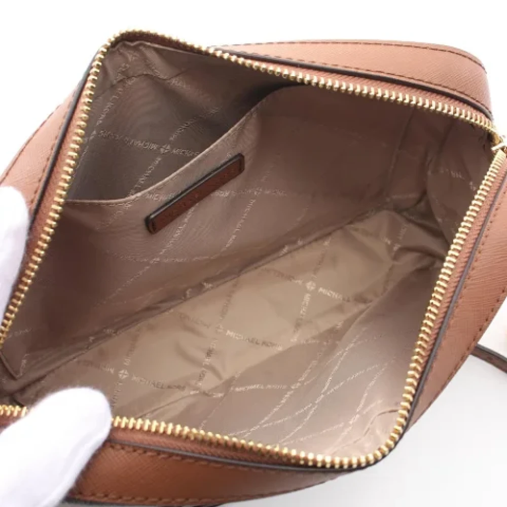 Michael Kors Pre-owned Canvas shoulder-bags Brown Dames