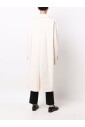 veste-en-coton-blanc-avec-un-bouton