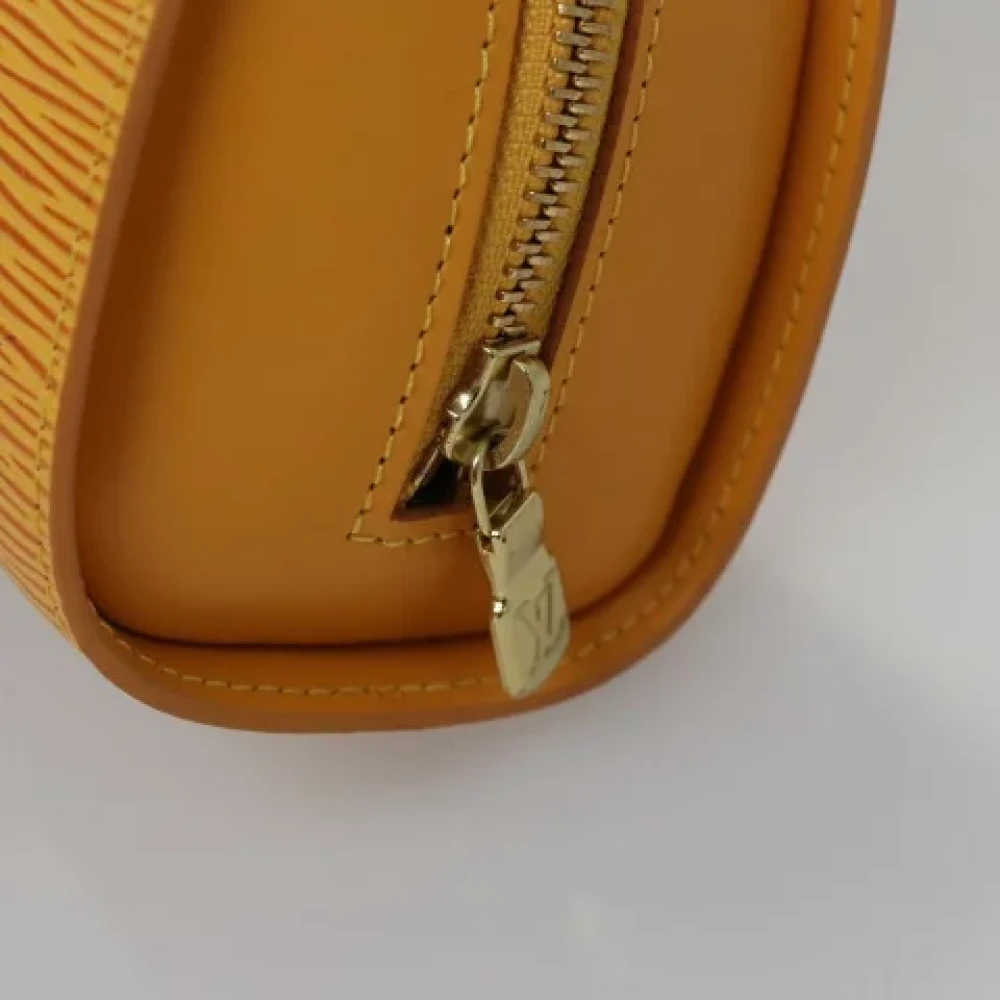 Louis Vuitton Vintage Pre-owned Leather pouches Yellow Dames