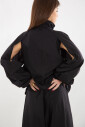 veste-en-nylon-decoupee-noire