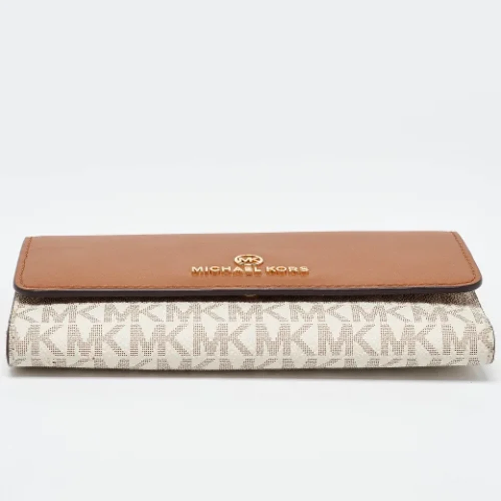 Michael Kors Pre-owned Leather wallets Brown Dames