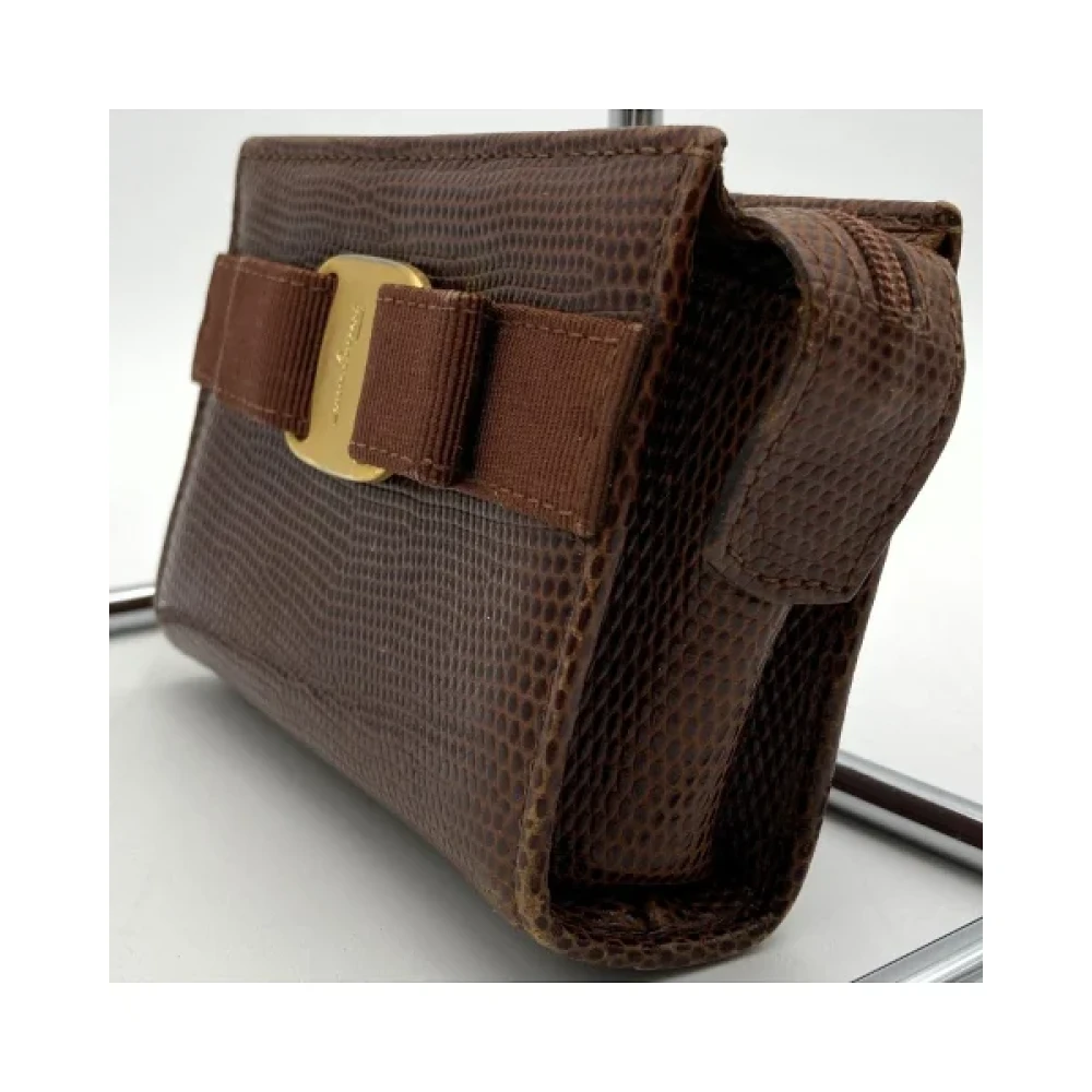 Salvatore Ferragamo Pre-owned Leather pouches Brown Dames