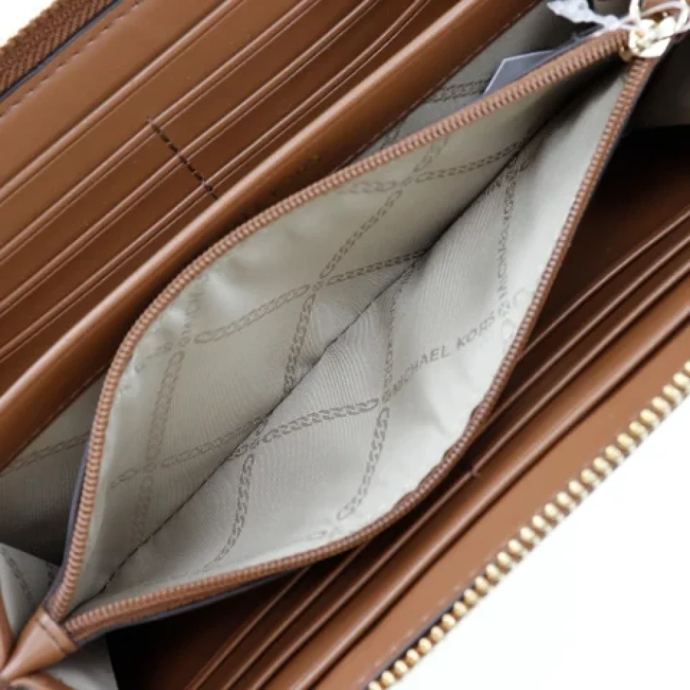 Michael Kors Pre-owned Leather wallets Brown Dames
