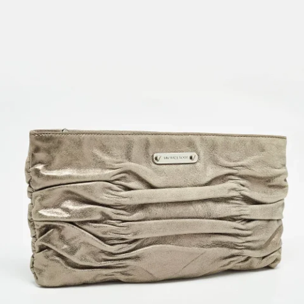 Michael Kors Pre-owned Leather clutches Gray Dames