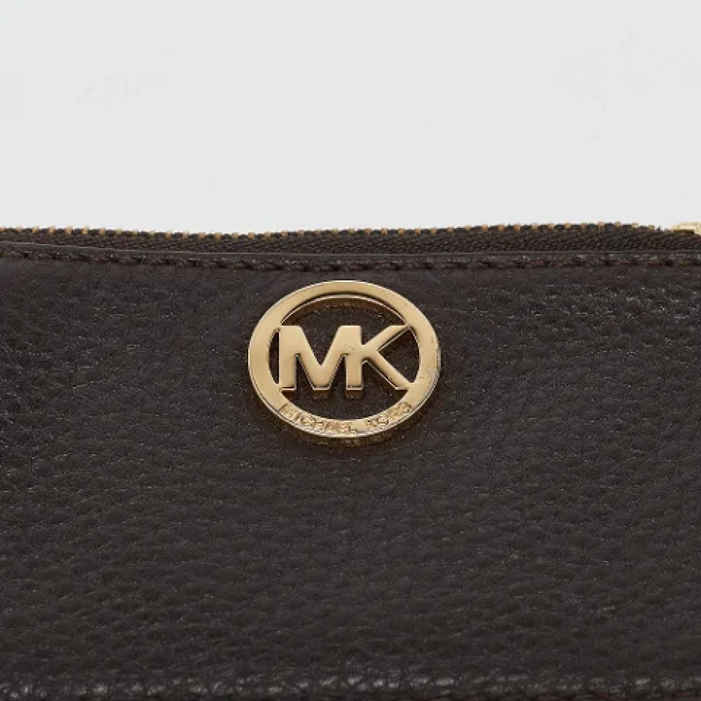 Michael Kors Pre-owned Leather wallets Brown Dames