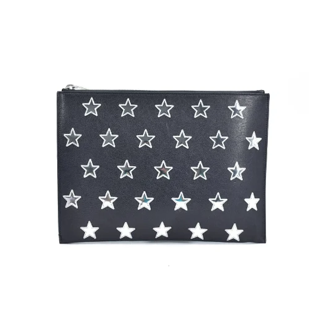 Yves Saint Laurent Vintage Echte zwarte leren sterrenpatch clutch Black Dames