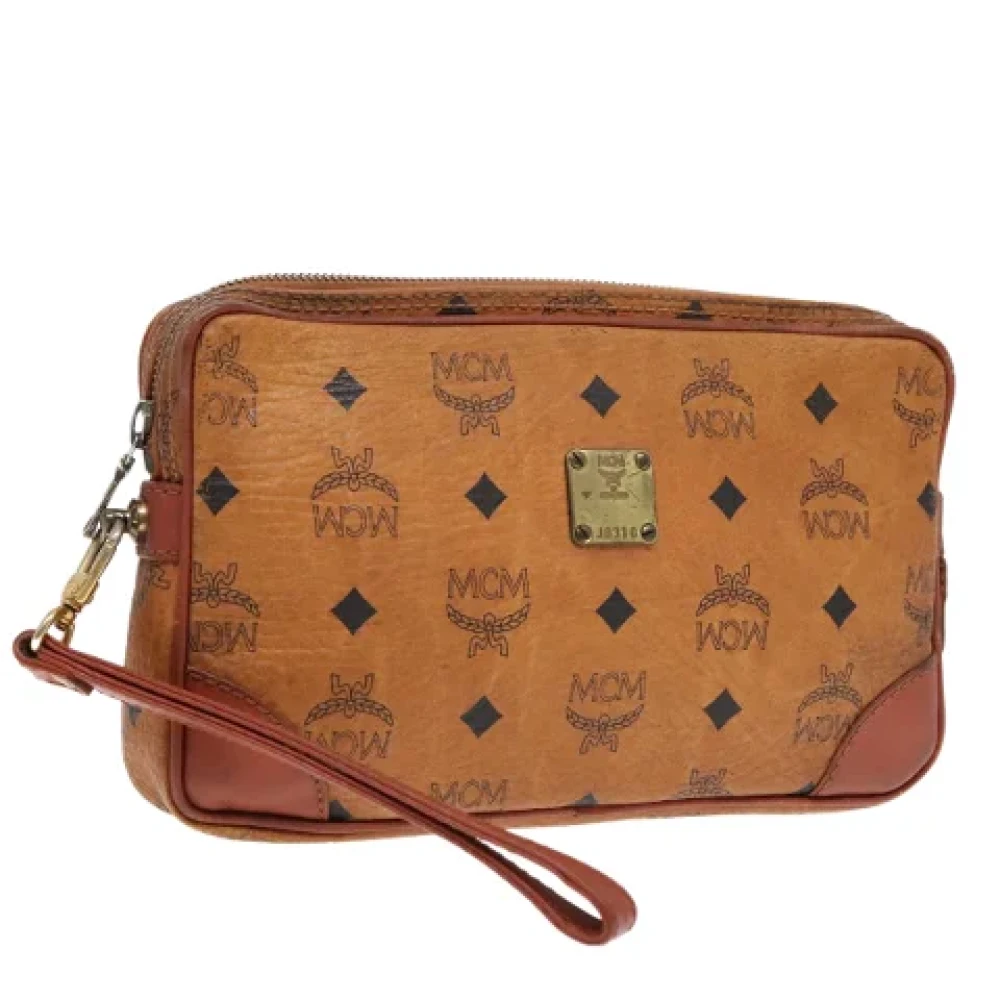 MCM Pre-owned Leather clutches Brown Dames