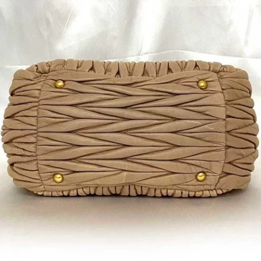 Miu Pre-owned Leather handbags Beige Dames