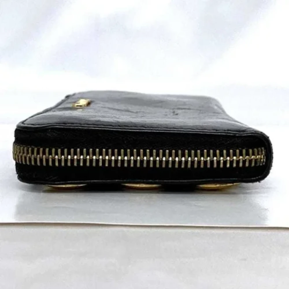 Miu Pre-owned Leather wallets Black Dames