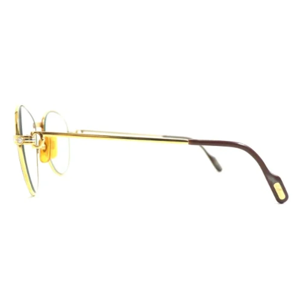 Cartier Vintage Pre-owned Metal sunglasses Yellow Dames