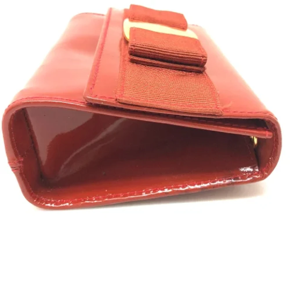 Salvatore Ferragamo Pre-owned Leather pouches Orange Dames